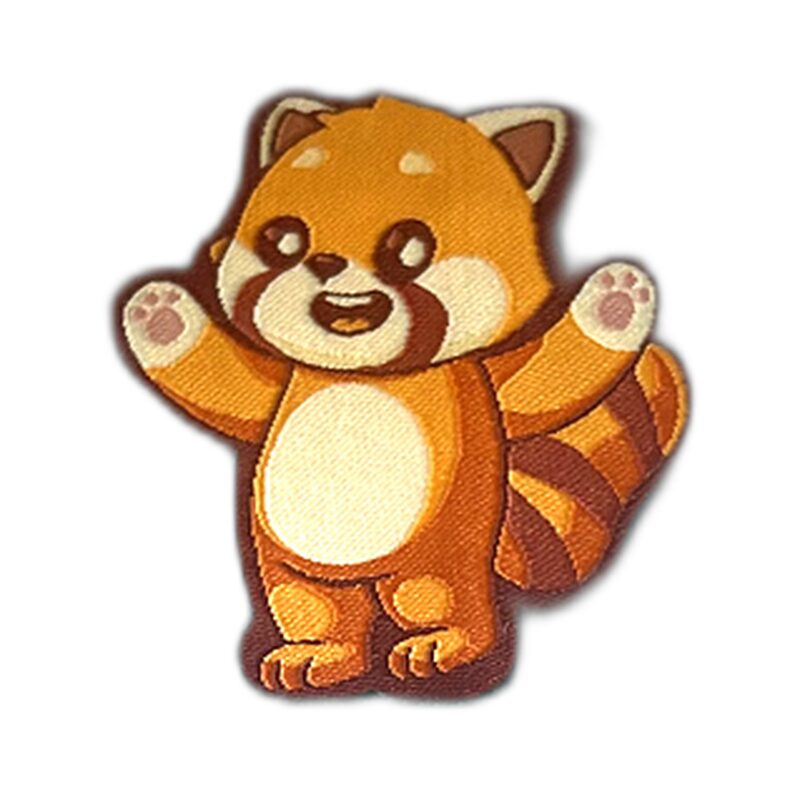 Curry the Red Panda iron-on patch on denim
